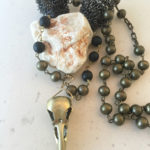 bird skull bead necklace